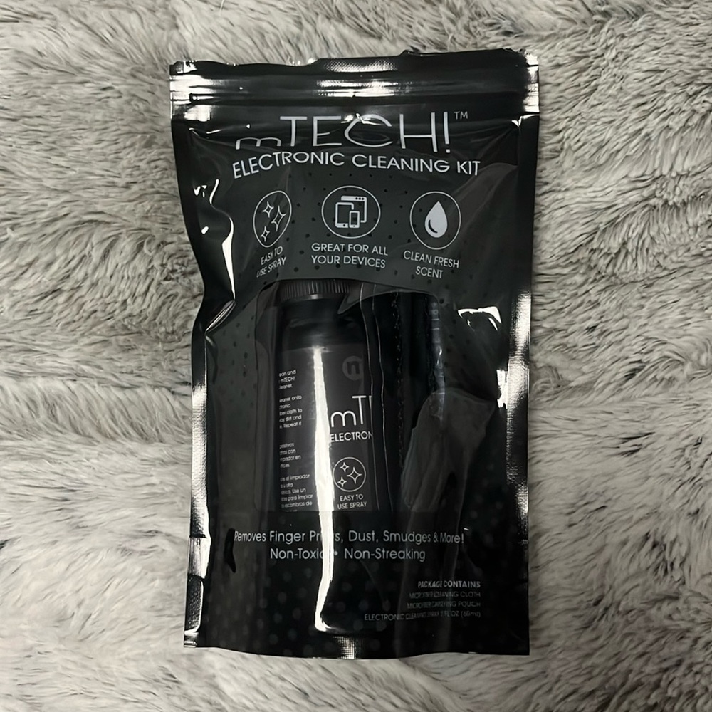 Brand new mTECH! cleaning kit > fully sealed pull tab was pulled